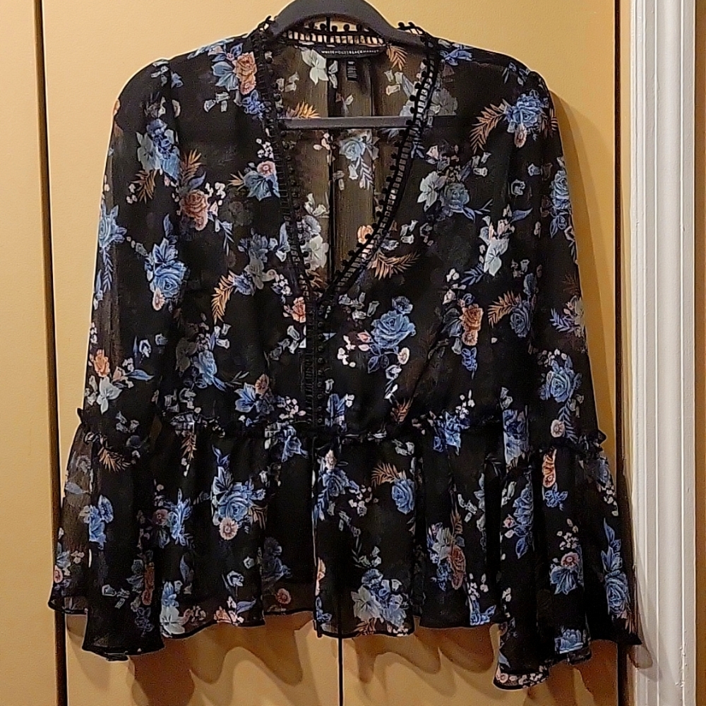 Women's sheer peasant style blouse with flowing sleeves